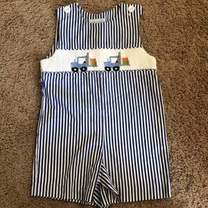 Adorable boy trucking outfit